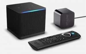 Amazon Fire TV Cube streaming device with remote control and power adapter on a white background