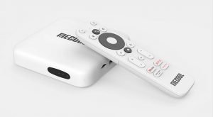 White Android TV box with remote control placed beside it, showcasing the MeCool branding